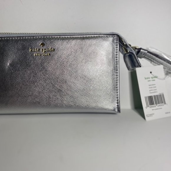 kate spade Handbags - ❤️ SALE! Host Pick! ❤️ NWT -- kate spade gold coast silver wallet/clutch